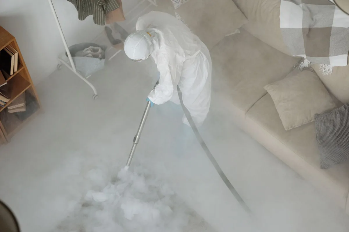 Biohazard cleanup technician in protective equipment, Chapin, SC